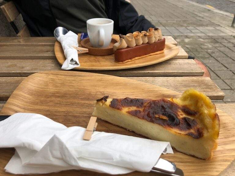 A plant-based custard flan on an eco-friendly plate on a table outside